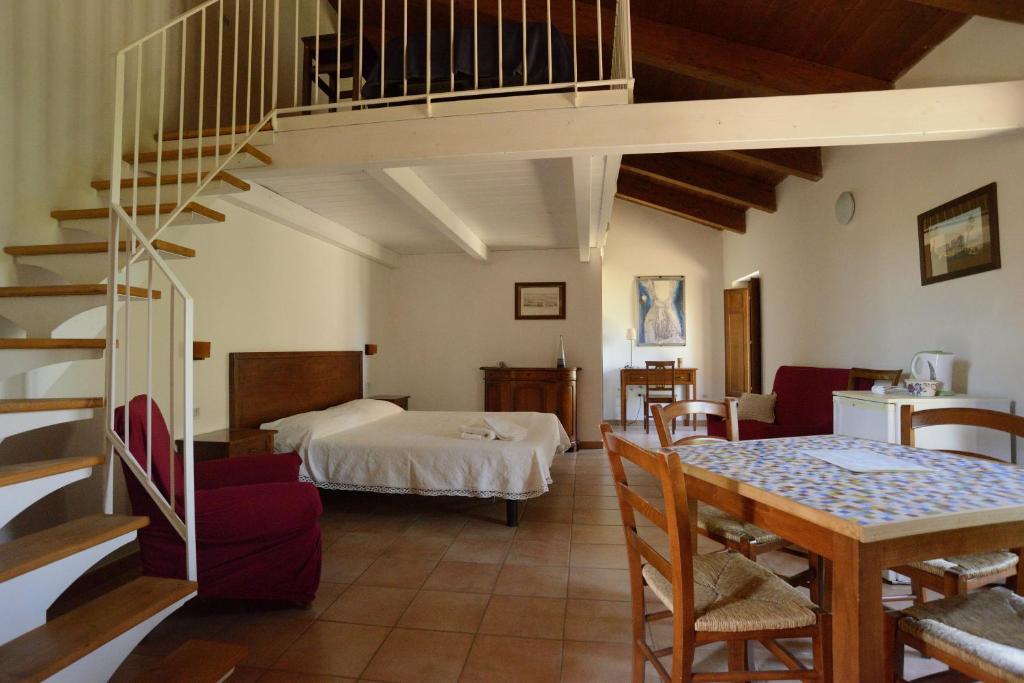 A bed or beds in a room at Casa del Geco