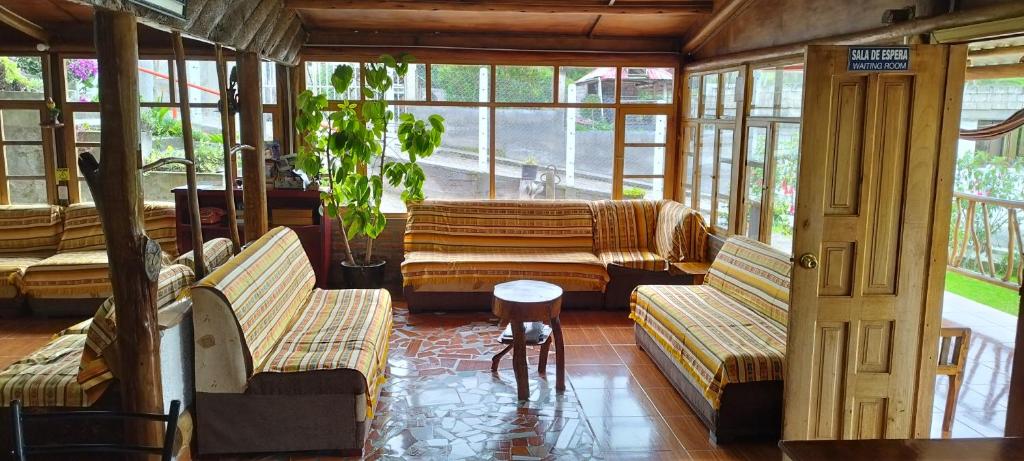 Posezení v ubytování Hostal Taita Cristobal