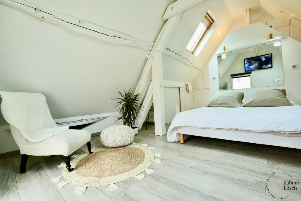 Posteľ alebo postele v izbe v ubytovaní Chez Marcel