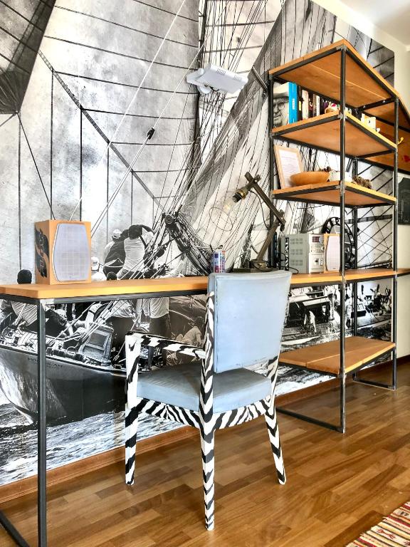 A seating area at Mascalzone Latino, City center apartment