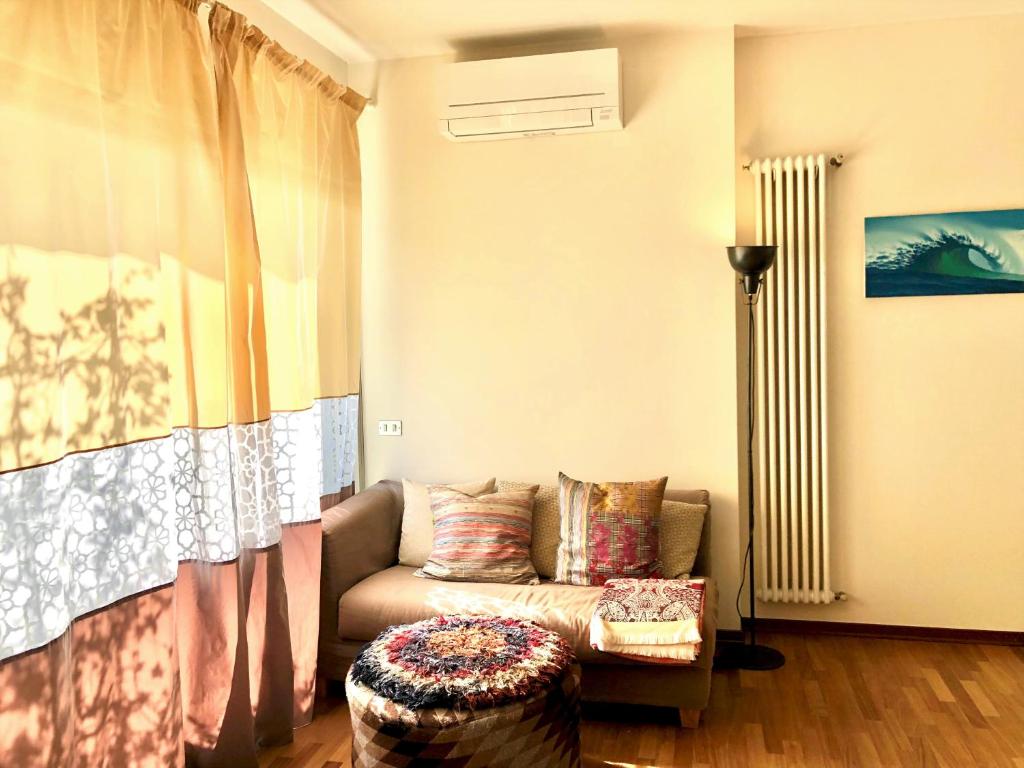 A seating area at Mascalzone Latino, City center apartment