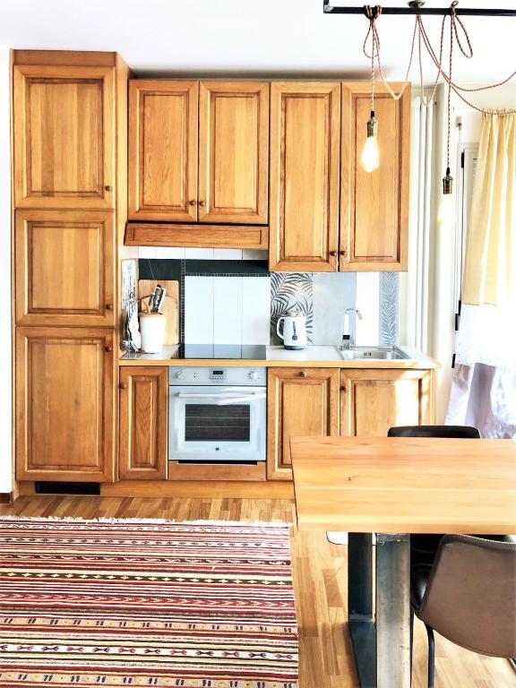 A kitchen or kitchenette at Mascalzone Latino, City center apartment