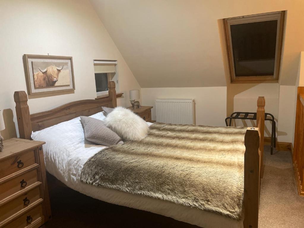 Postel nebo postele na pokoji v ubytování Cleadale flat
