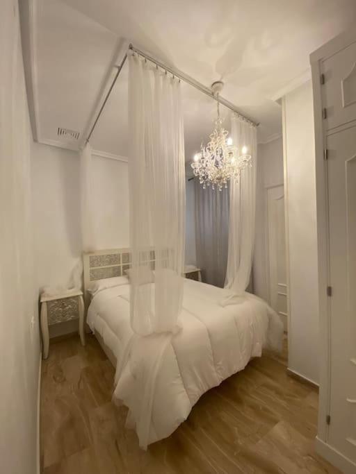Posteľ alebo postele v izbe v ubytovaní Casa Mina Cadiz