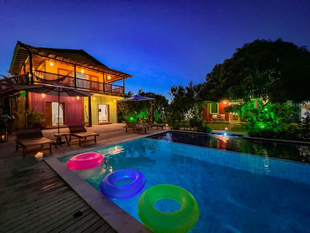 Bazén v ubytování Pousada Casa Sítio Delícia do Quadrado nebo v jeho okolí