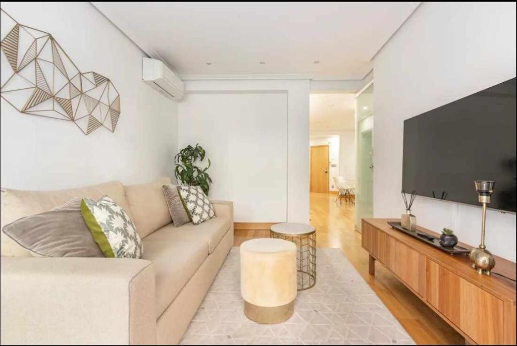 A television and/or entertainment centre at Luxury Old TownGeneral Jauregi AC
