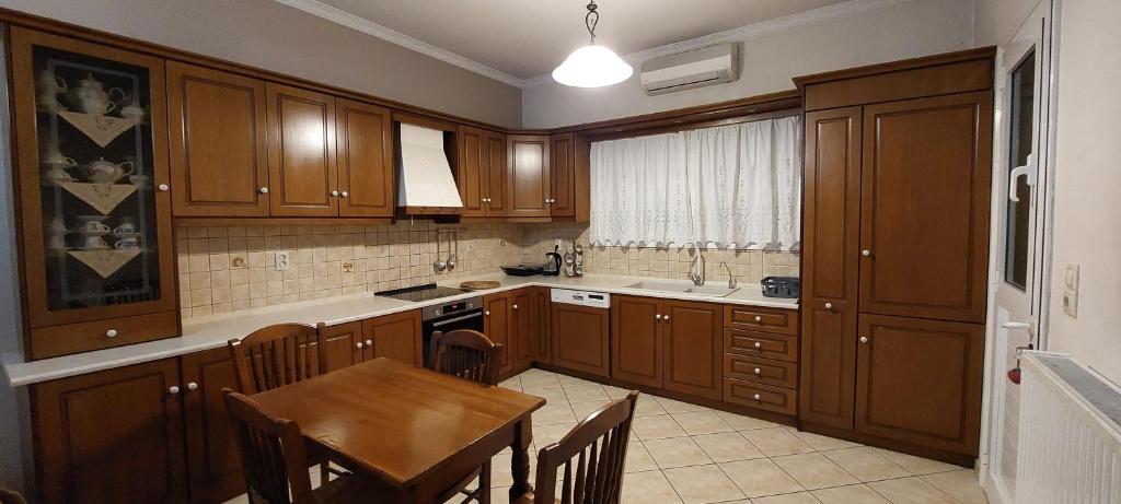 Kuchyň nebo kuchyňský kout v ubytování Kallistimon House