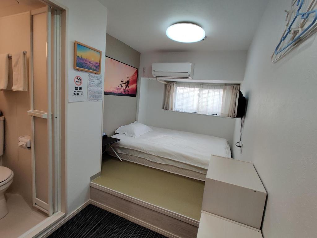 Postel nebo postele na pokoji v ubytování da inn