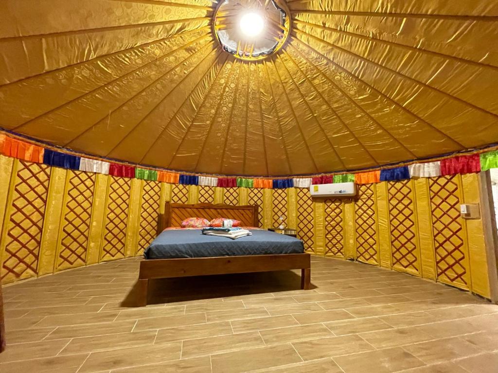 Postel nebo postele na pokoji v ubytování El Valle Resort & Spa - Aguas Termales