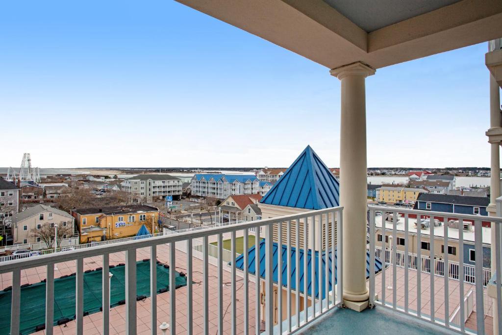 a balcony with a view of a city at Belmont Towers 608 in Ocean City