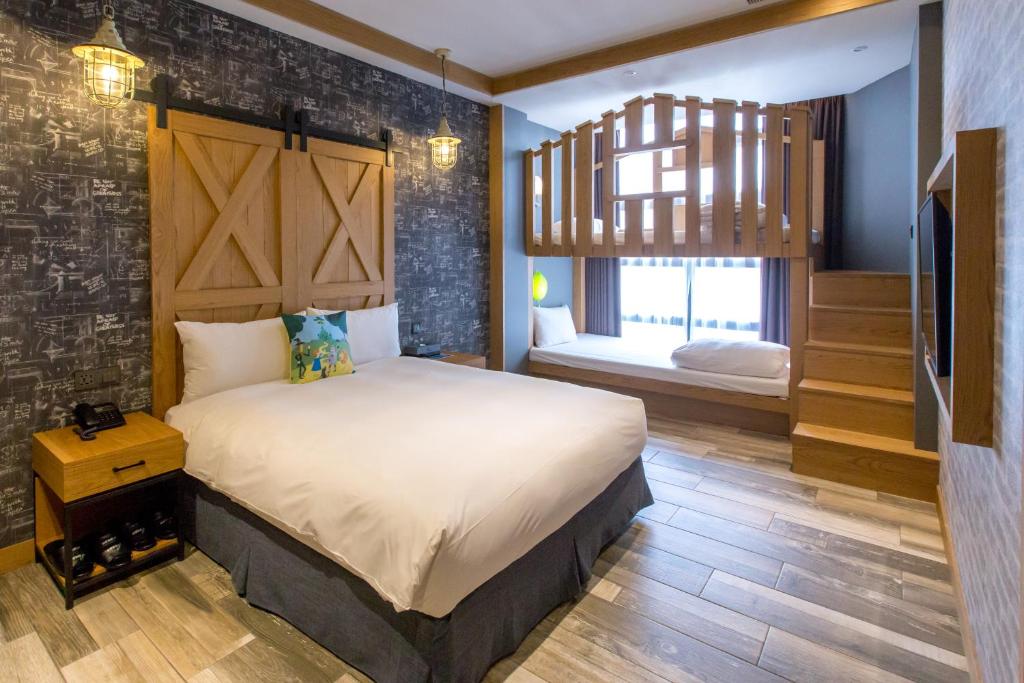Postel nebo postele na pokoji v ubytování Norway Forest Travel hotel 3 Taichung
