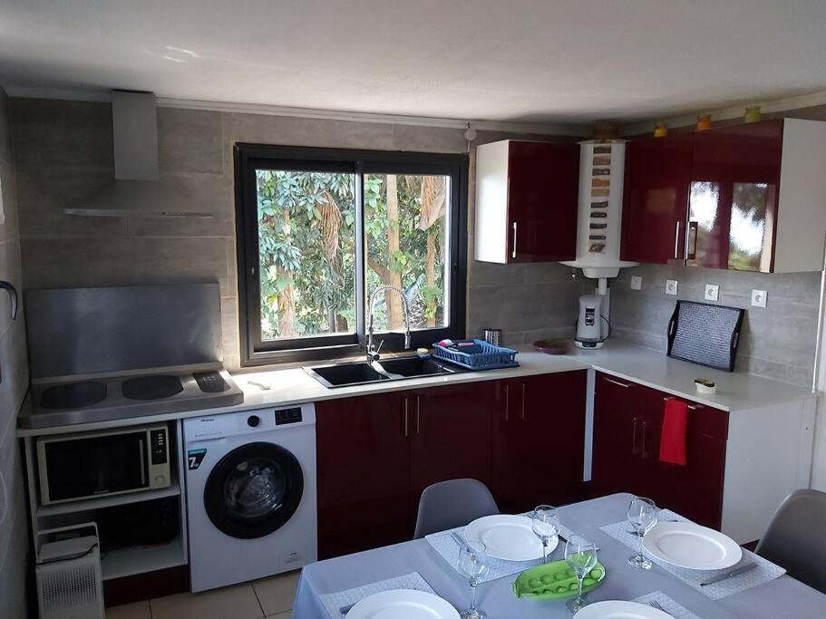 Kuchyň nebo kuchyňský kout v ubytování Appartement agréable, accès rapide.