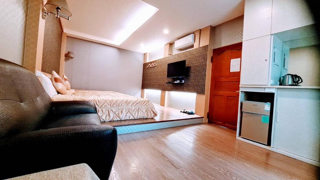 TV a/nebo společenská místnost v ubytování Chu Han C&C B&B Homestay