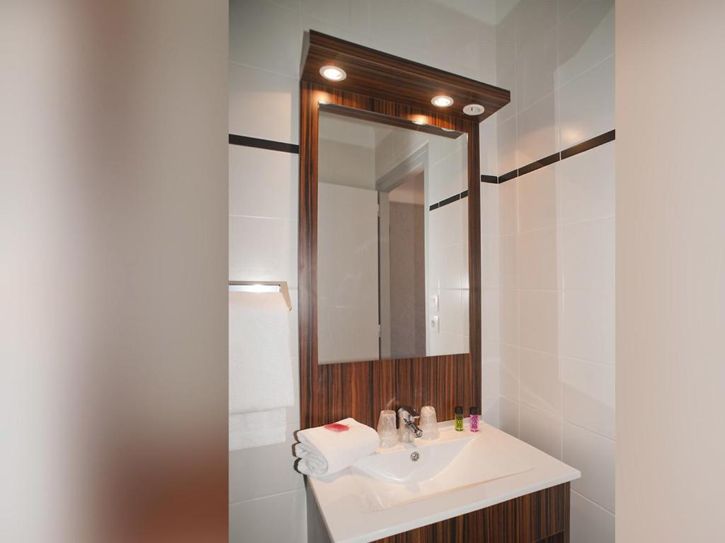 Koupelna v ubytování Hôtel Beau Rivage