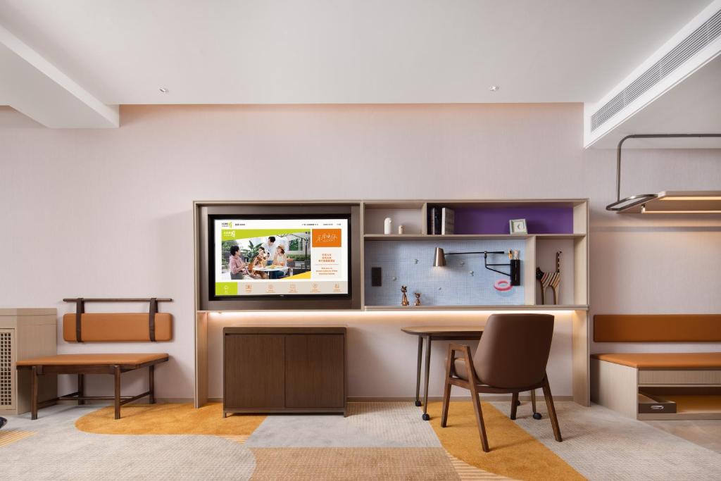 TV o dispositivi per l'intrattenimento presso Home2 Suites By Hilton Shenzhen Dalang