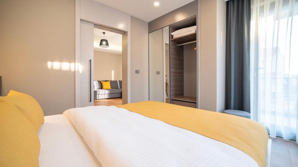 Postel nebo postele na pokoji v ubytování Vesta Rooms