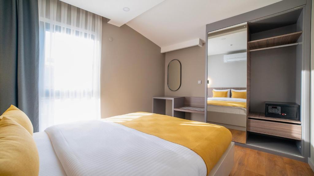 Postel nebo postele na pokoji v ubytování Vesta Rooms