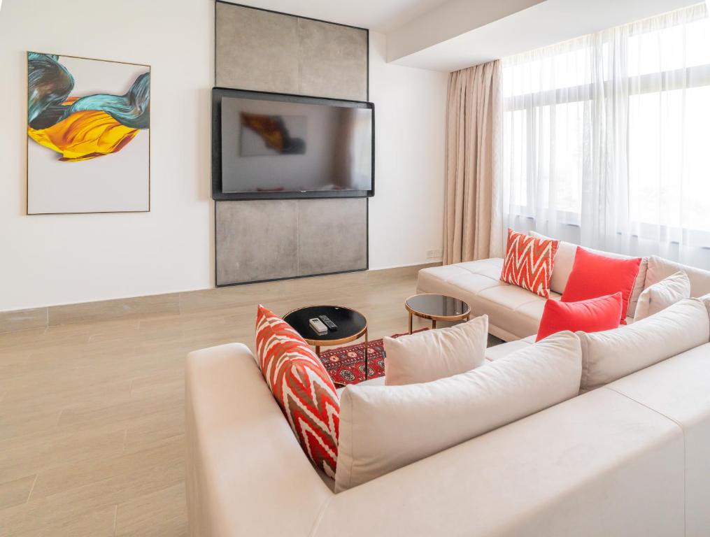TV a/nebo společenská místnost v ubytování Sarova Imperial Hotel