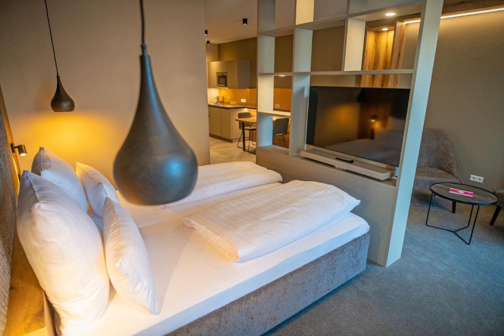 Postel nebo postele na pokoji v ubytování GUESTHOUSE FELSENLAND