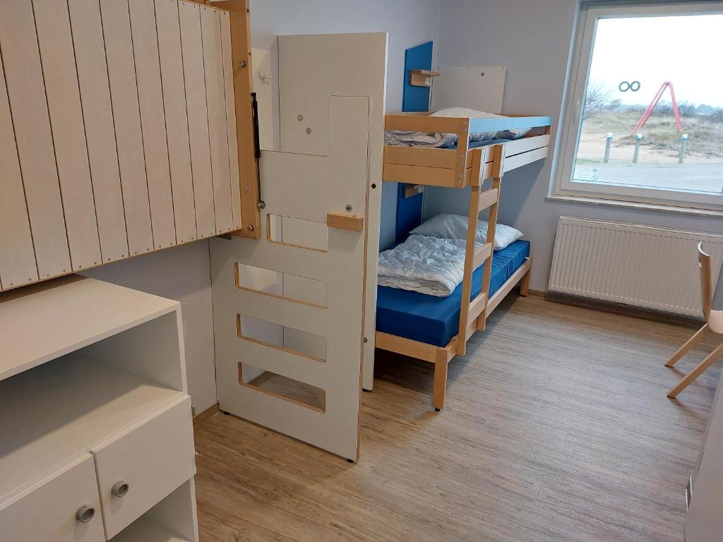 Postel nebo postele na pokoji v ubytování CVJM Freizeithaus MS Waterdelle