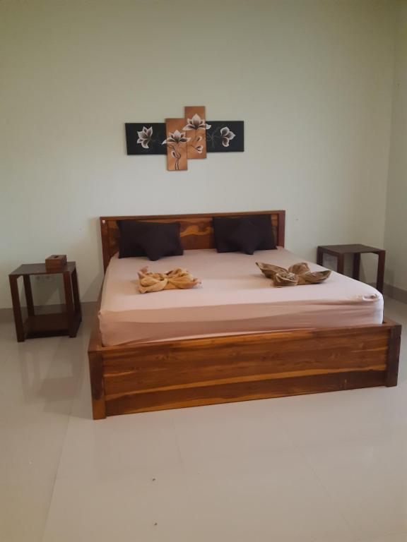 Postel nebo postele na pokoji v ubytování kamala