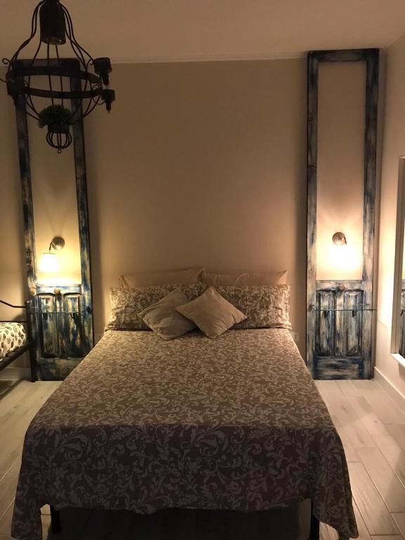 Postel nebo postele na pokoji v ubytování Casa Daflanna in Salento - Libeccio (monolocale)