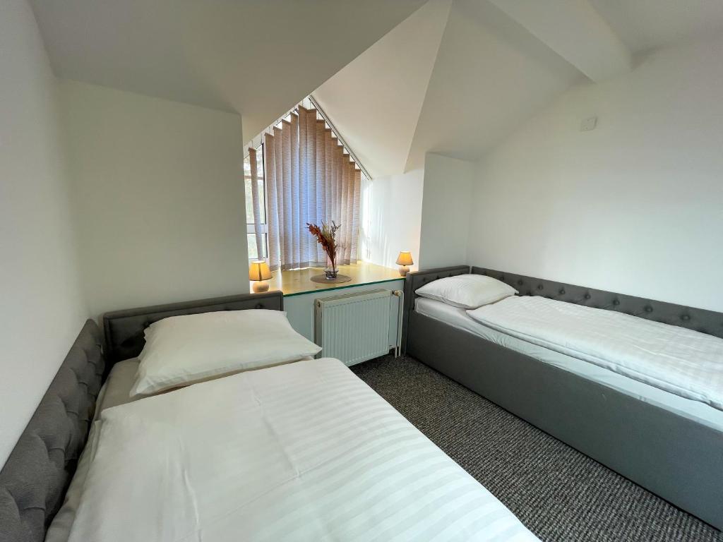 Postel nebo postele na pokoji v ubytování Hotel COLCHI