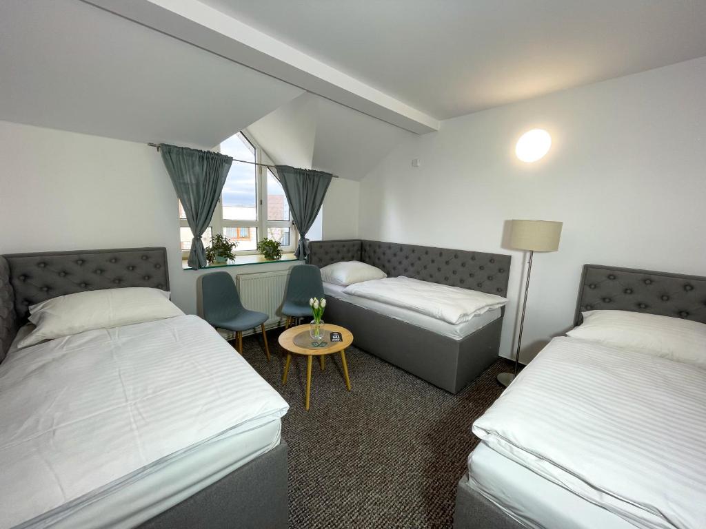 Postel nebo postele na pokoji v ubytování Hotel COLCHI
