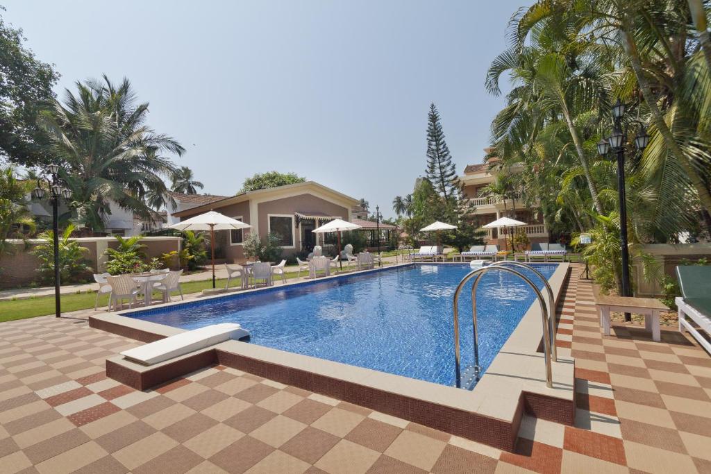 Bazén v ubytování De Mandarin Beach Resort Suites & Villas, Candolim nebo v jeho okolí