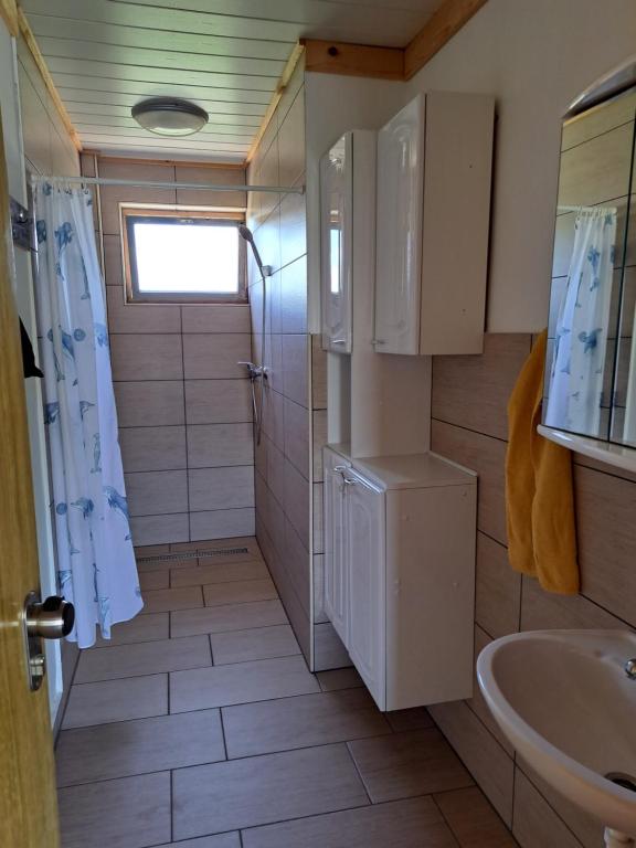 Koupelna v ubytování GLAMPING HOUSE RANČ LUŽE