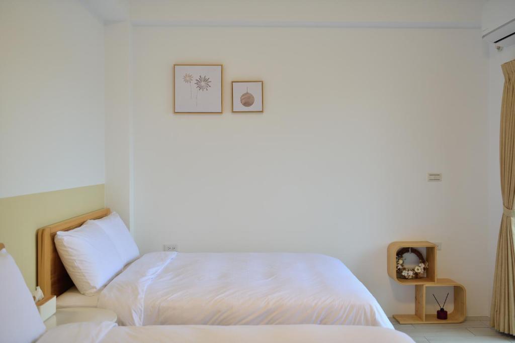 Postel nebo postele na pokoji v ubytování Sunny day B&B