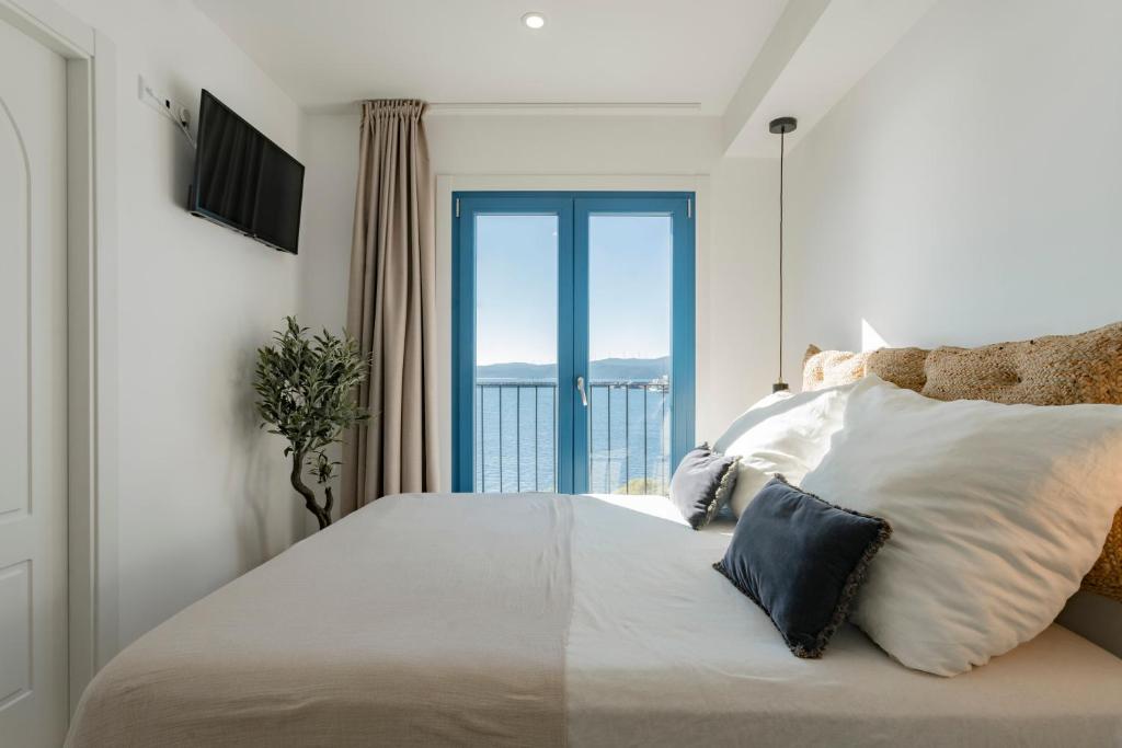 A bed or beds in a room at O mar de preciosa