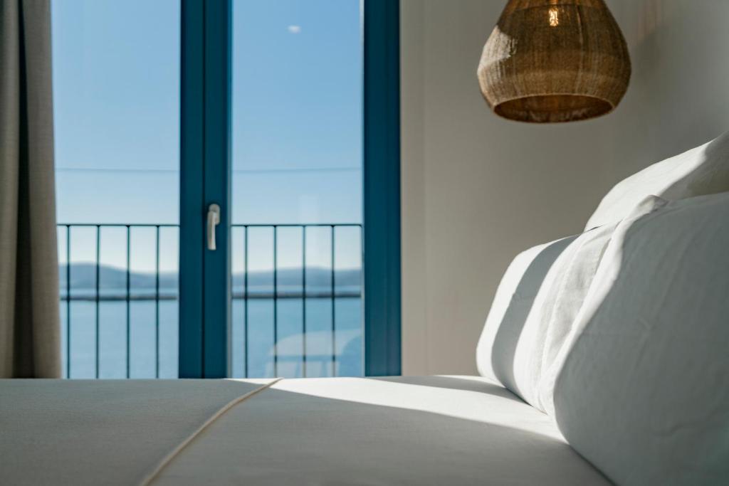 A bed or beds in a room at O mar de preciosa