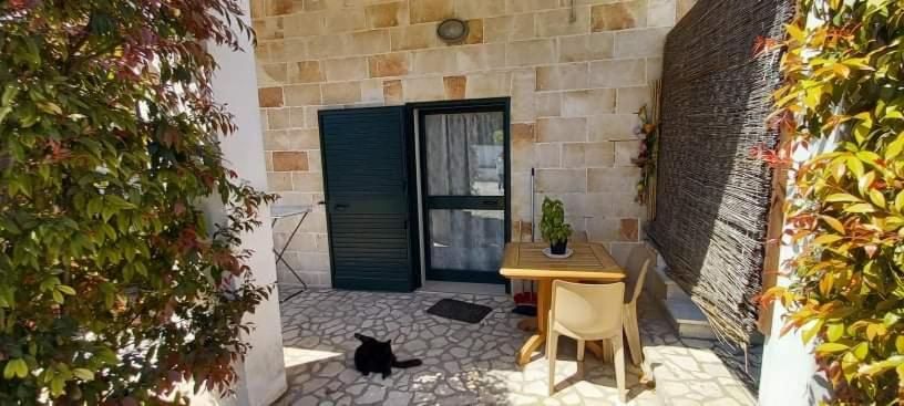 Patio lub wspólna przestrzeń na świeżym powietrzu w obiekcie Appartamento Porto Cesareo