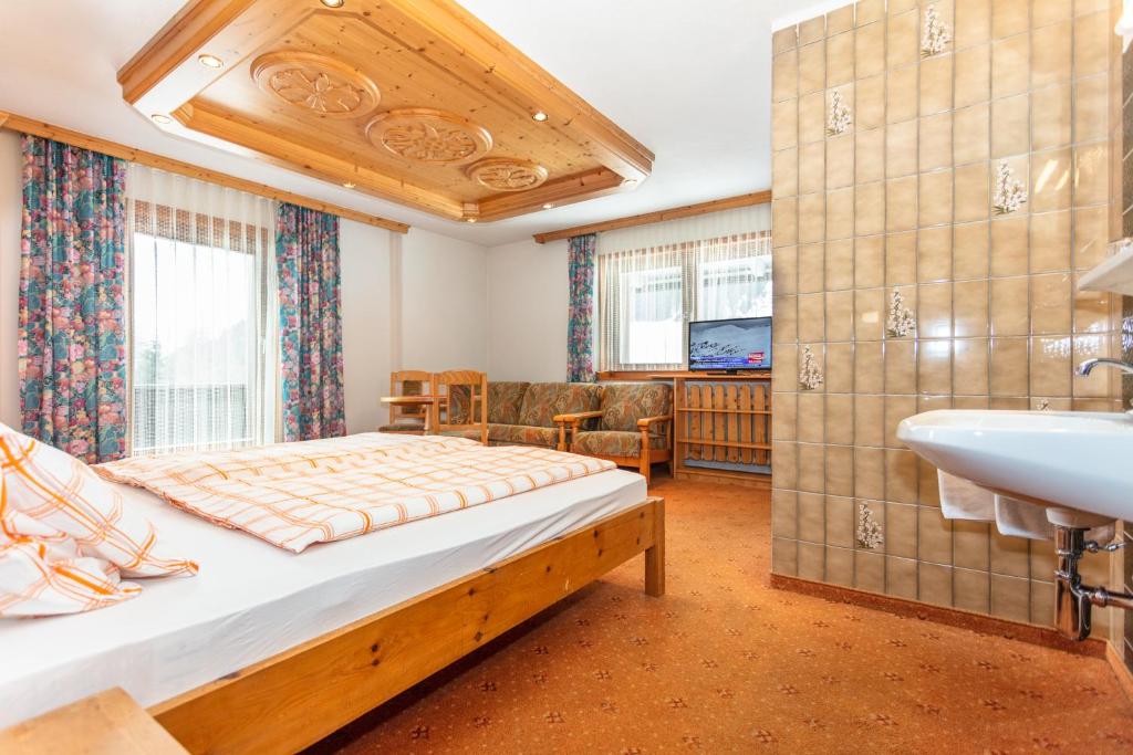 Postel nebo postele na pokoji v ubytování lechner living apartments