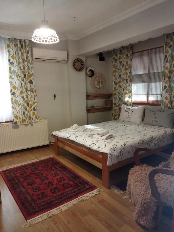 Postel nebo postele na pokoji v ubytování Nelly Guesthouse