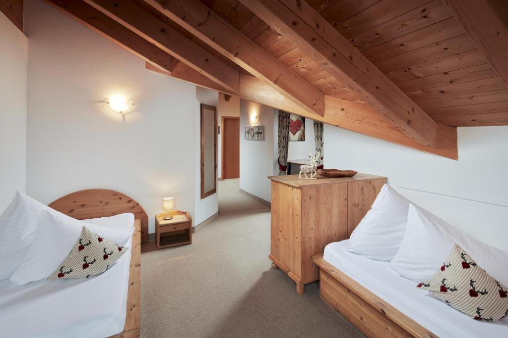Postel nebo postele na pokoji v ubytování Maximilian Appartements