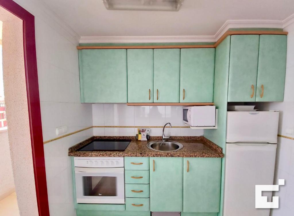 Kuchyňa alebo kuchynka v ubytovaní Apartamento Amatista 29A - Grupo Turis