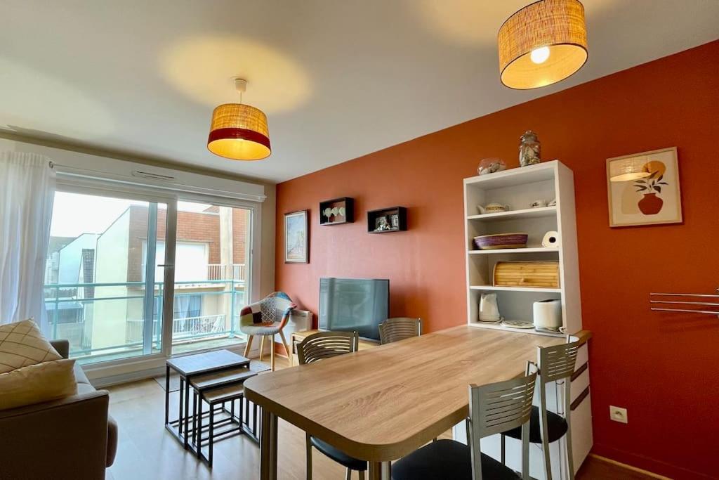 Posedenie v ubytovaní Appartement MerliDunes Proche de la plage