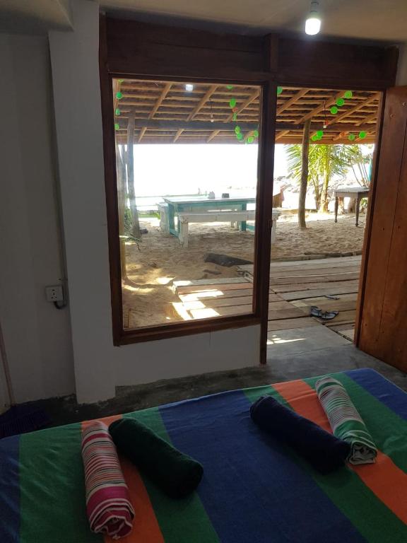 Postel nebo postele na pokoji v ubytování Ceylon Beach Home