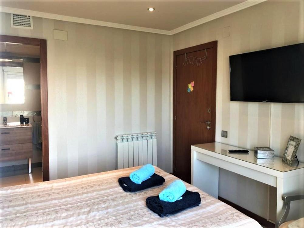 Posteľ alebo postele v izbe v ubytovaní Apartamento Amposta