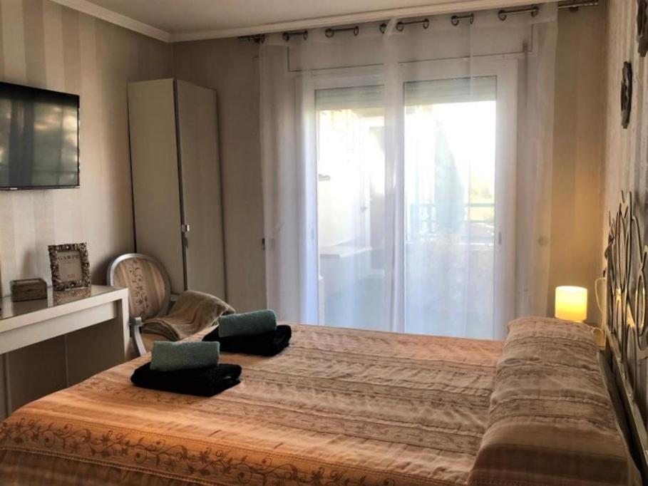 Posteľ alebo postele v izbe v ubytovaní Apartamento Amposta