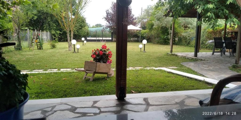 a view of a park with a box of flowers at Sevi Platamon Home in Platamonas