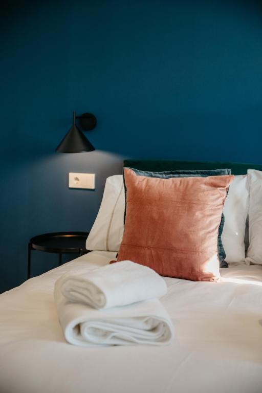 Postel nebo postele na pokoji v ubytování tuGuest Obispo Apartment