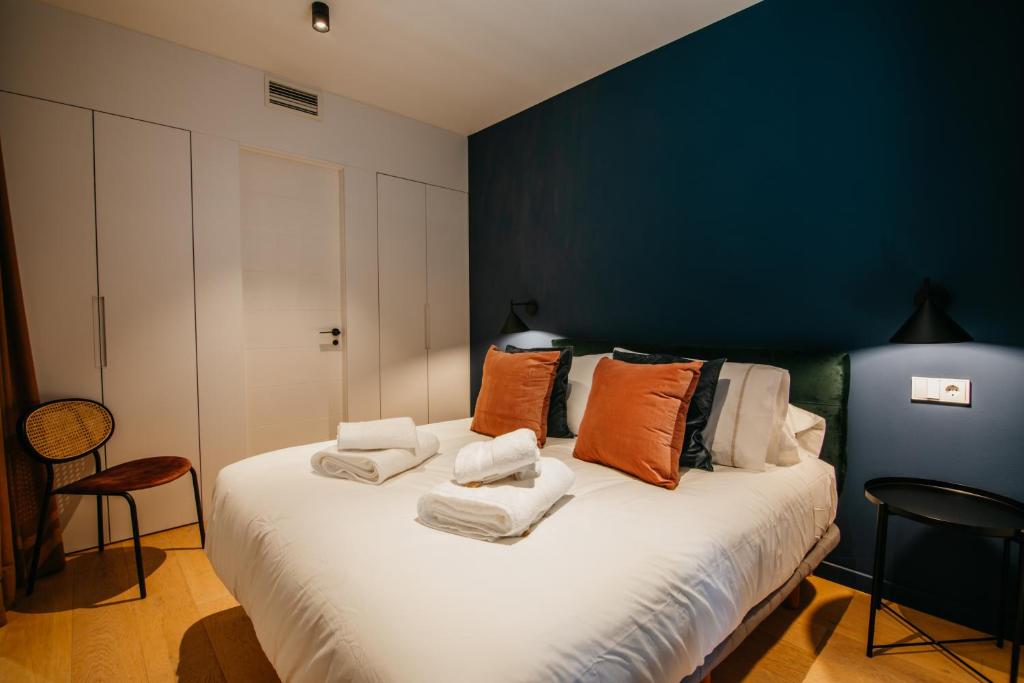 Postel nebo postele na pokoji v ubytování tuGuest Obispo Apartment