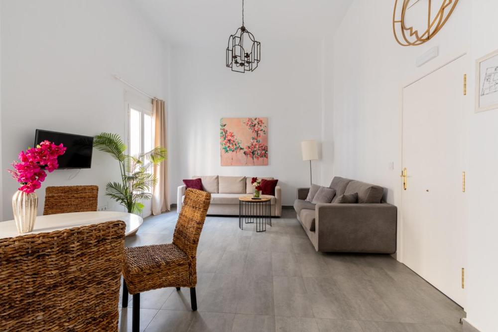 Televízia a/alebo spoločenská miestnosť v ubytovaní Casa Palacio Sanlúcar de Barrameda