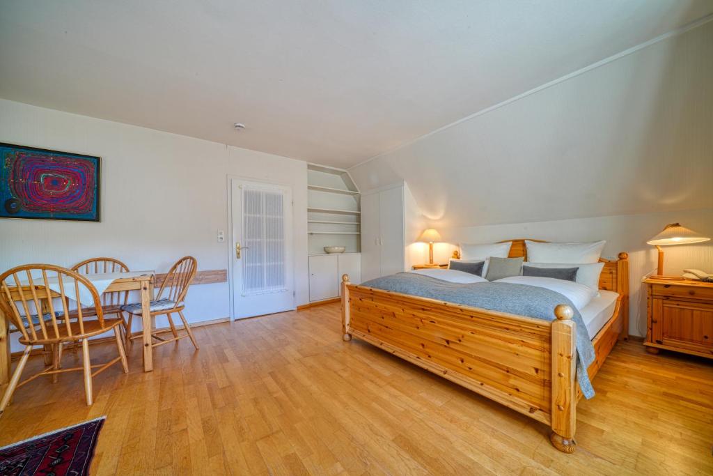 Postel nebo postele na pokoji v ubytování Hotel Zur Eule