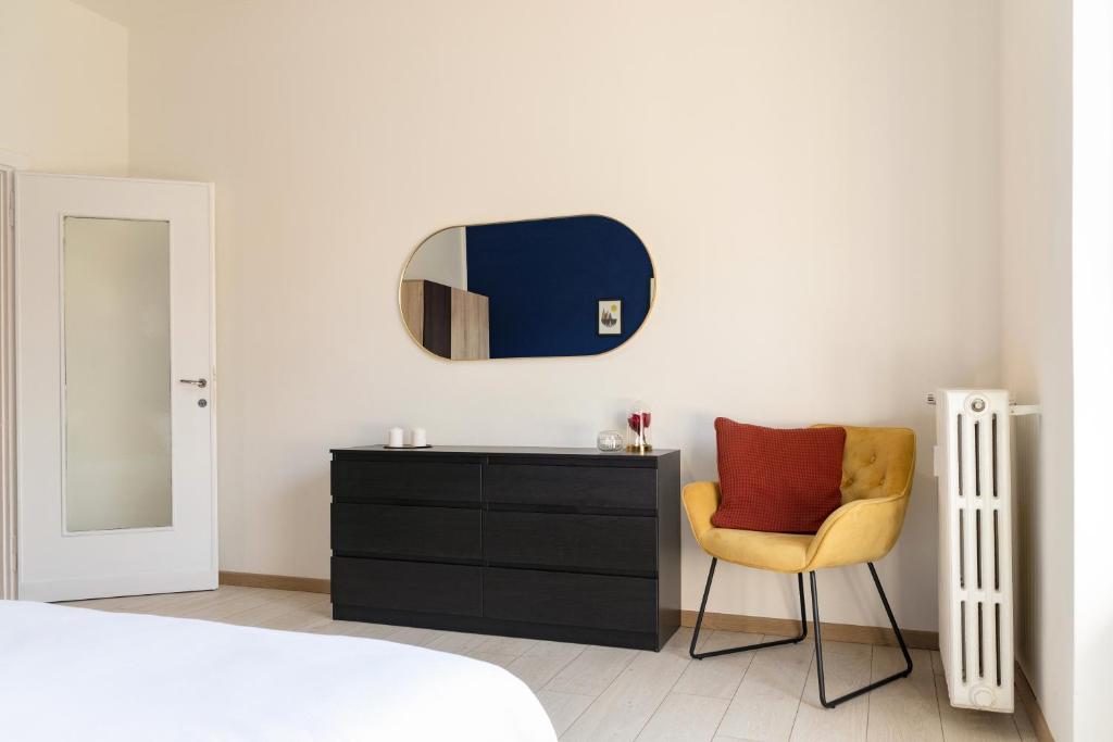 A bed or beds in a room at Accomodo MIT12 Trivano Linate