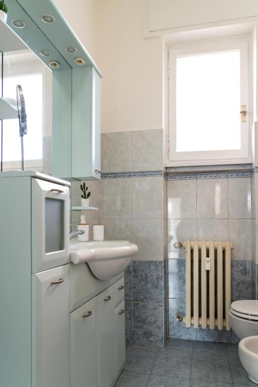 A bathroom at Accomodo MIT12 Trivano Linate