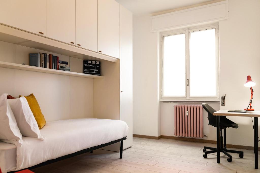 A bed or beds in a room at Accomodo MIT12 Trivano Linate